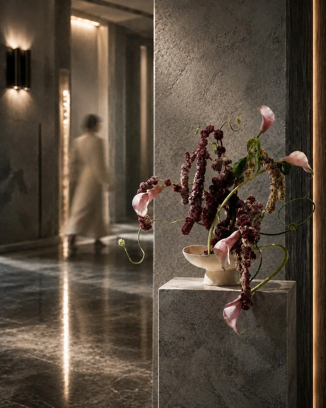 A figure carrying the standard away down a marble corridor