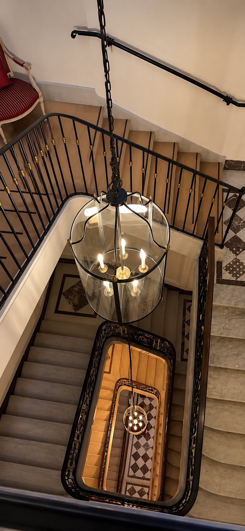 The spiral staircase — the diagnostic logic carried floor to floor